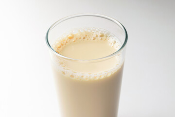 Soy milk on white background