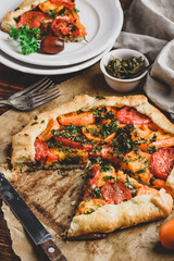 Sliced tomato galette on baking paper