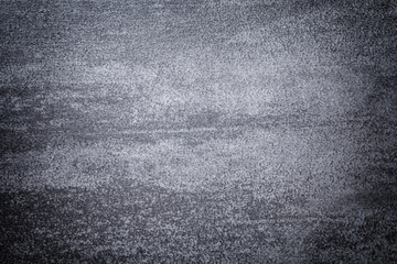 Texture of light gray old stone material with cracked pattern, macro background.