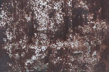 Very old rusted sheet iron. Textured metal surface. Remains old paint, rusty metallic rough material.