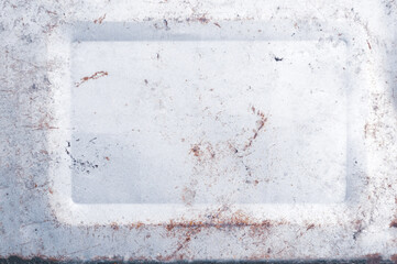 Rough surface old wall, white concrete slab with rust, brown rusty color, textured background close-up, exposure to atmosphere, outdoors.