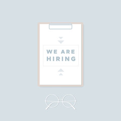 Clipboard with message and glasses. We are hiring. Vector illustration, flat design