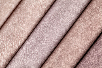 Swatch of velvet textile brown shade colors, background.