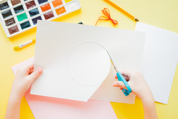 DIY Easter card. How to make paper bunny for Easter greetings. Step by step photo instruction. Cut the circle to the fold line. Step 2.