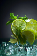 Cocktail with lime, ice and mint.
