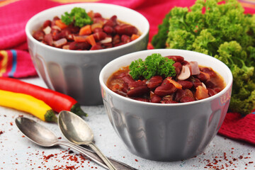 Two bowls with traditional Georgian dish - lobio