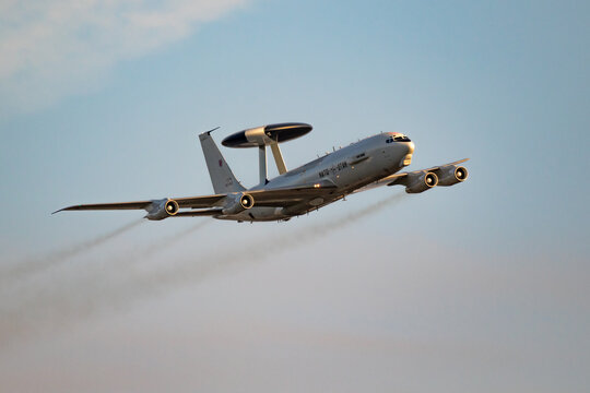 NATO Boeing E-3 Sentry AWACS radar plane performing a low-pass at the Sanice Sunset Airshow. Belgium - September 13, 2019.
