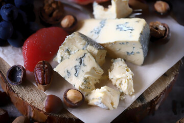 Gorgonzola cheese with nuts and fruits. Cheese plate. Wine appetizer.