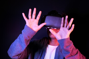  young man wearing virtual reality headset, vr box.