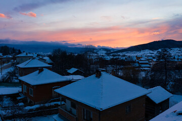 Aerial winter sunset landscape from Bulgaria village in Rhodope mountains