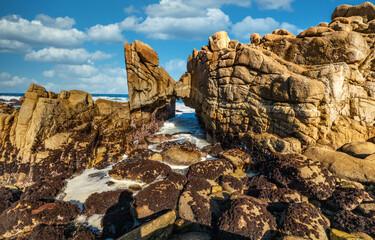 Beautiful landscape, long exposure of water, scenic coastline of Monterey, Kissing Rock view, Pacific Grove, Monterey, California, USA.