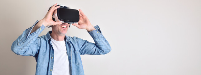 Man with virtual reality glasses light isolated background