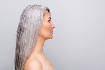 Profile photo of pensioner beautiful natural white haired woman look empty space isolated grey background