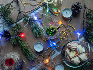 Photo New Year's flat ley. Christmas background.  colorful decorations. new year multi-colored illumination. craft bags