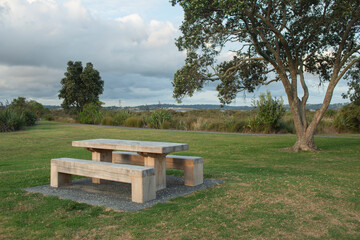 picnic bench in the coastal walk ways in Te Atatu Peninsula, Auckland, New Zealand