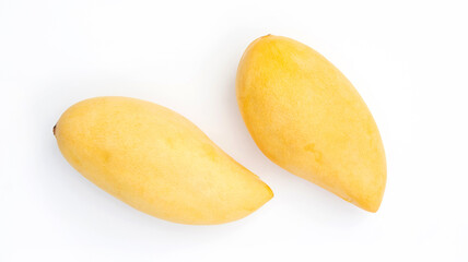 Ripe Barracuda mango on a white background.