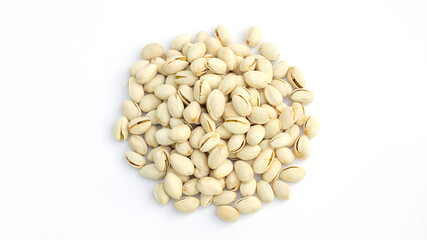 Pistachio nuts on a white background.