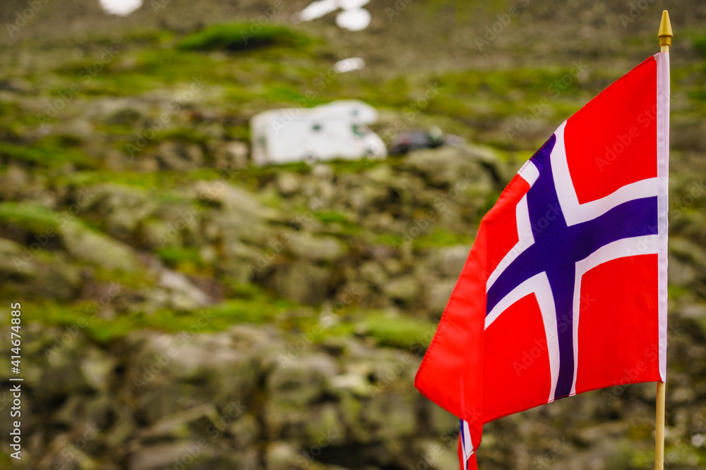 Wall mural norwegian flag and camper car in mountains