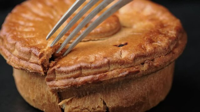 Take a bite of tasty British beef steak pie with wine gravy.