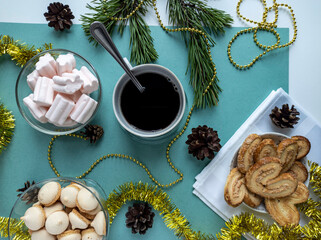 new year's flat lay. green background. top view photo. Christmas decorations, coffee. New year, Christmas, Valentine's day.