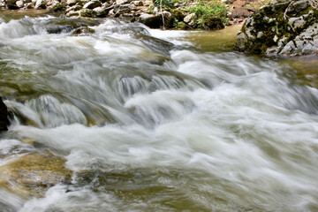 water flowing over rocks