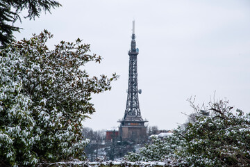 Snow covered Metallic tower of Fourviere situated in the Fourviere hill in Lyon, France.