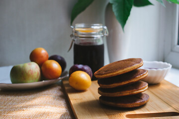 still life with honey and apple