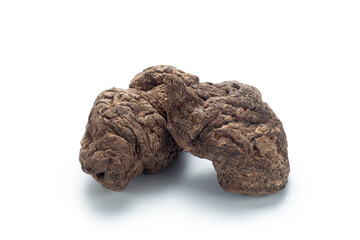 Dried rhizome of rehmannia (Sheng Di Huang), Isolated on white background. Chinese herbal medicine.