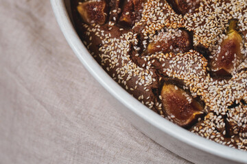 Vegan pie with figs in a ceramic bowl