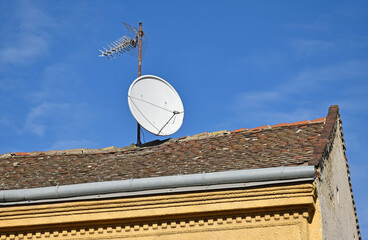 House roof with television antennas