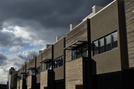 Modern Apartment Building Against The Cloudy Sky In Melbourne, Australia