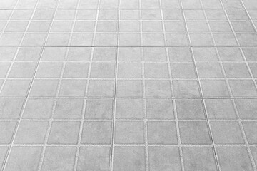 The modern white concrete tile floor background and texture