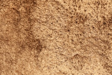 Brown natural stone wall texture and background