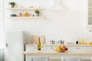 Fototapeta na wymiar Stylish kitchen interior with green plants, home decoration and rent flat