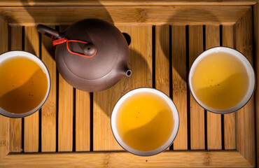 tea ceremony chinese teapot made of yixing ceramics - obrazy, fototapety, plakaty