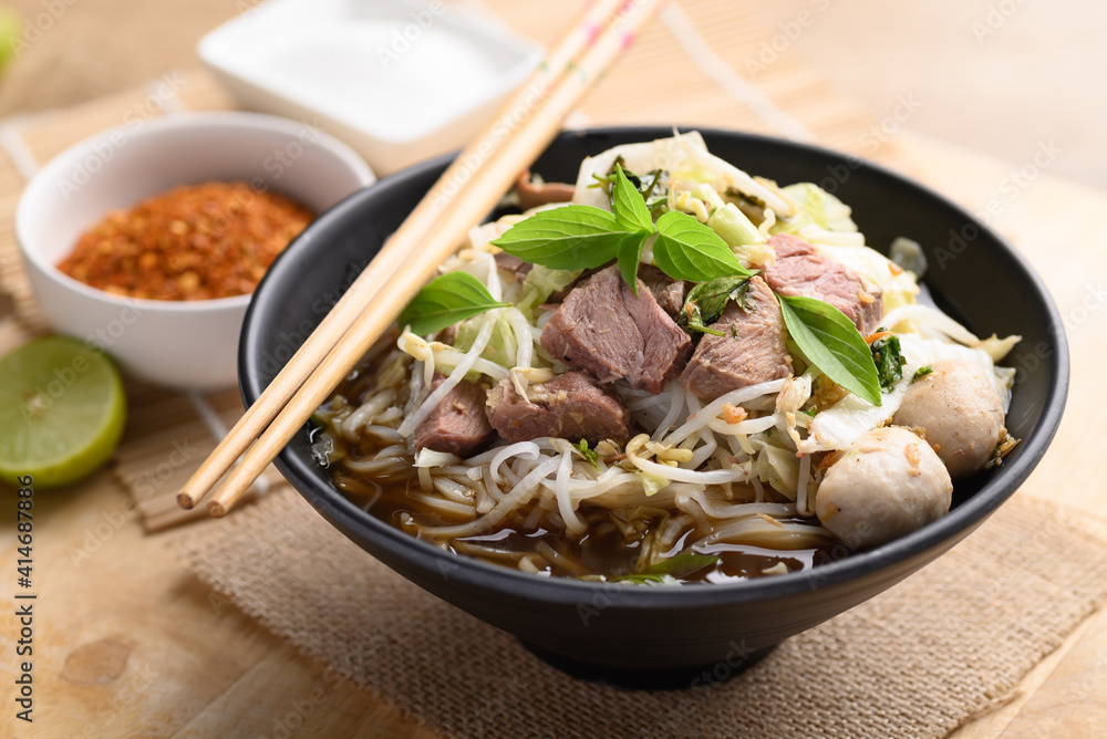 Canvas Prints rice noodle soup with pork, pork ball and vegetables in a bowl, thai noodles soup