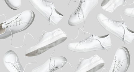 Flying white leather womens sneakers isolated on gray background, different kind. Fashionable...