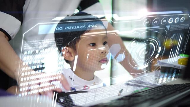 Asian little young boy student learning of the virtual display,Future technology concept.