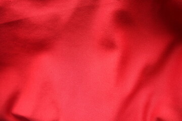 Red silk surface Looks elegant, used for making a craft background.