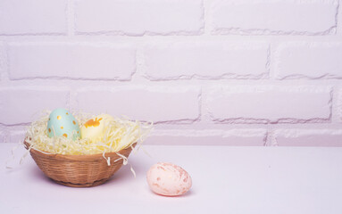 Easter painted eggs on a light background, a festive background for your decoration. Easter background, place for text