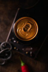 Close up of a can of beer on a black background