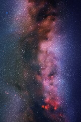 Night starry sky and Milky Way. Space vertical background with nebula © arvitalya