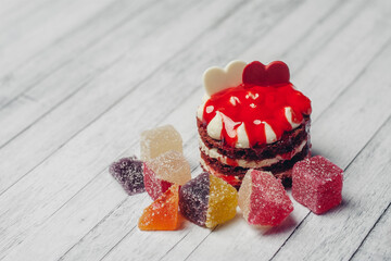 marmalade sweets diet food chocolate wooden background top view