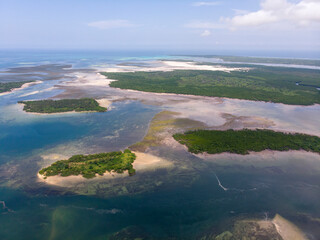 Uninhabited Tropical Islands in Indian Ocean. Aerial view of Pemba Island, Zanzibar. Tanzania....