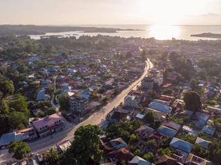 Poster Aerial shot of Pemba island, zanzibar archipelago. Wete city at sunset time © Oleksandr