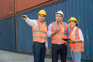 Employees and executives put Uniform  to work on the Container Yard, the team work together to deliver overseas products to the destination.Logistics concept