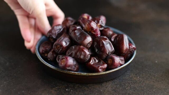 dates fruit fresh and sweet dried fruits, dessert portion on the table healthy meal snack outdoor top view copy space for text food background rustic image diet vegan or vegetarian food