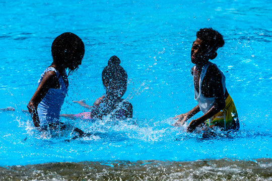 Kids Playing Together In Waterpark