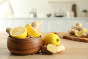 Fresh lemons and ginger on wooden table indoors