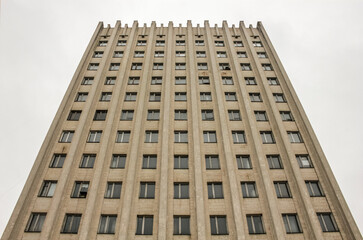 Fototapeta premium low angle view of an old concrete building in eastern europe